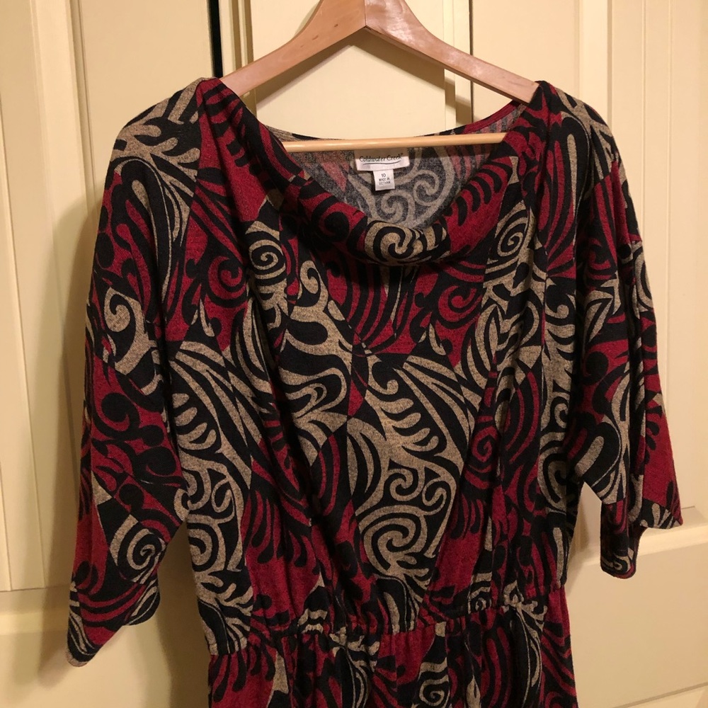 Flattering Dress with elbow length sleeves.